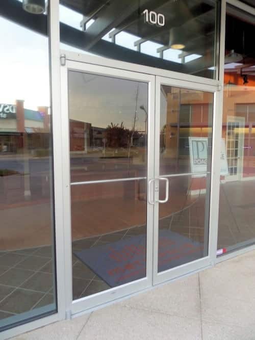 storefront glass door with door pivots